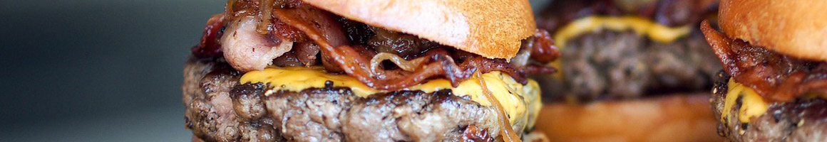 Eating Barbeque Breakfast & Brunch Burger at K T's Smokehouse restaurant in Blanchard, OK.
